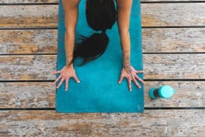 yoga practitioner on yoga mat
